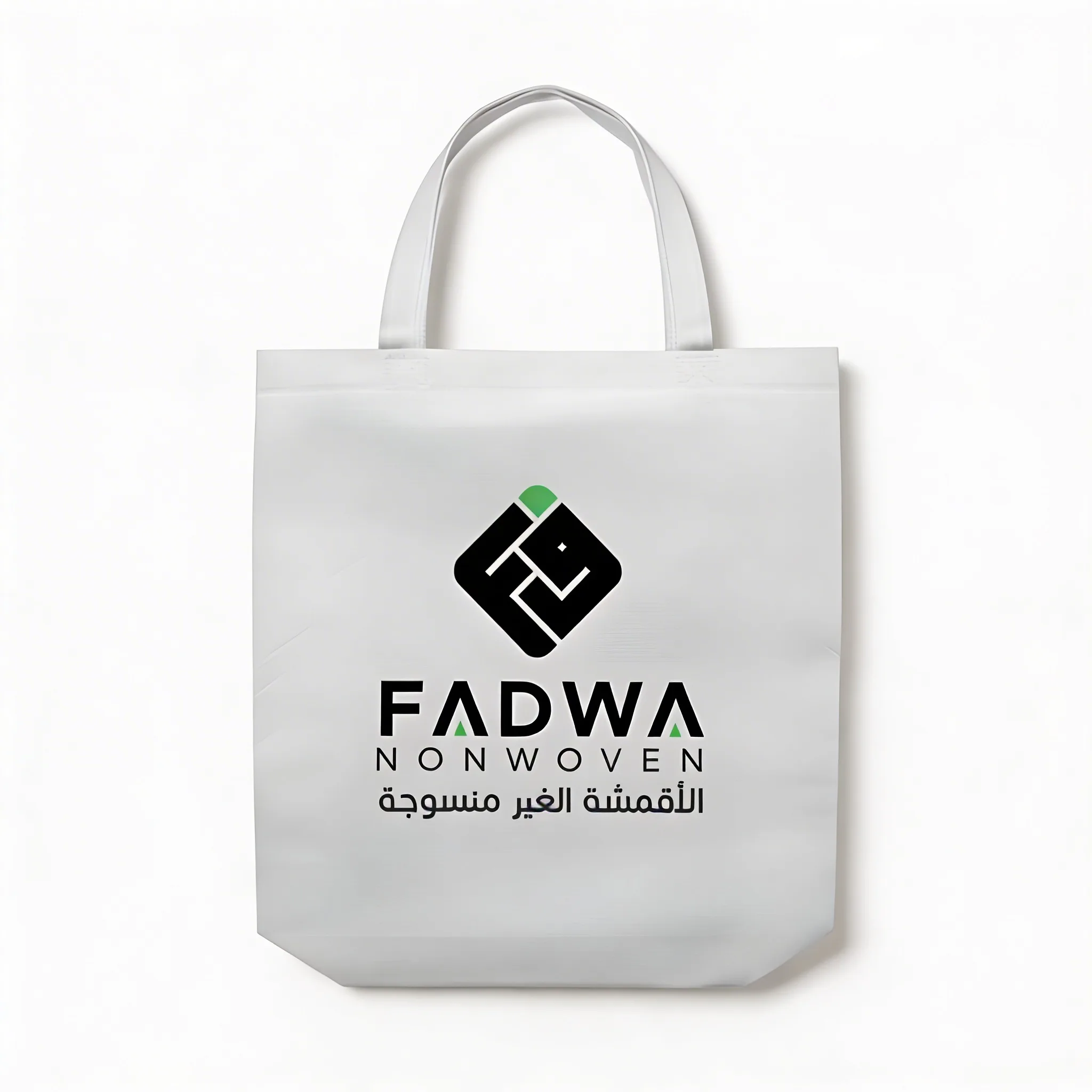A plain white non-woven side gusset shopping bag with a printed black and green company logo, displayed from a three-quarters angle to show its depth and loop handle.